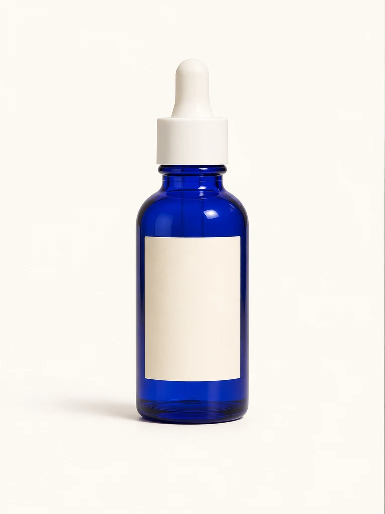 Original cobalt-blue serum bottle on a clean studio background.